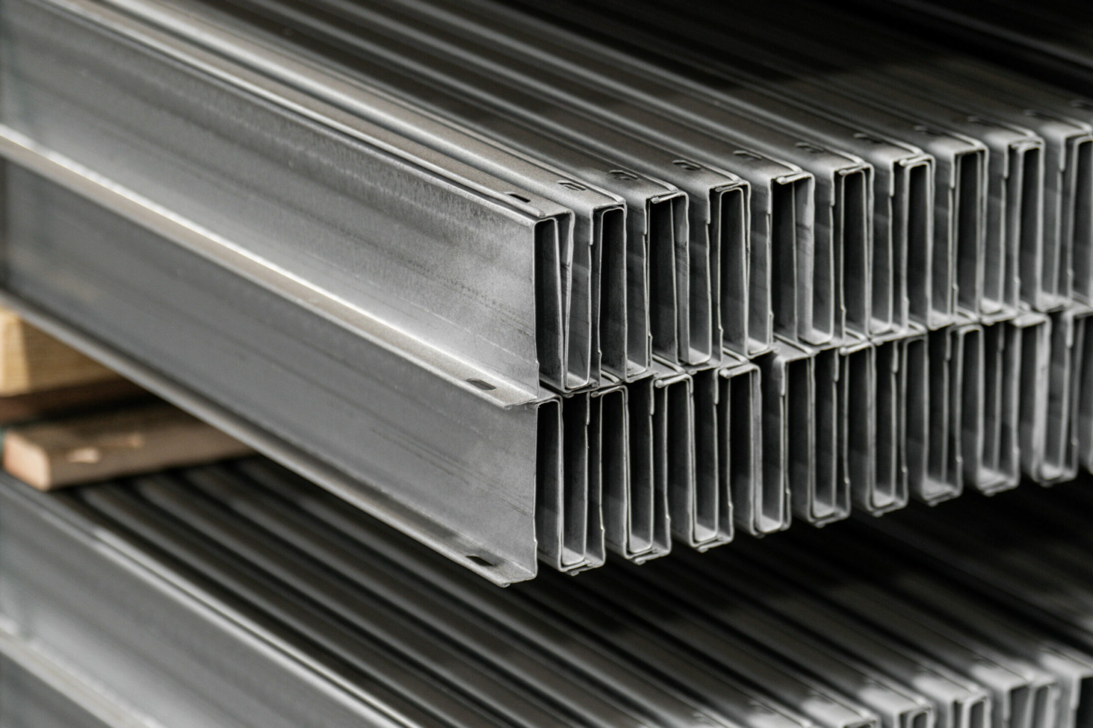 Steel strut for garage door reinforcement